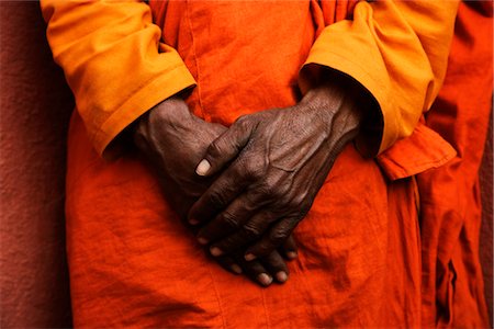Monk standing with his hands clasped, Bodhgaya, Gaya, Bihar, India Foto de stock - Con derechos protegidos, Código: 857-03553669