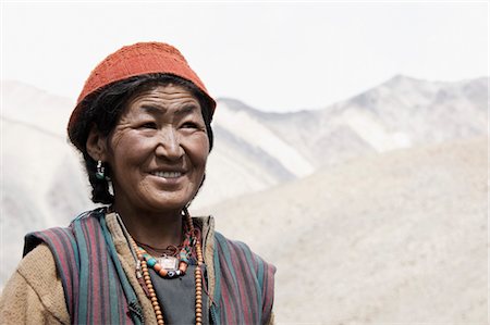 Close-up of a woman smiling, Ladakh, Jammu and Kashmir, India Foto de stock - Con derechos protegidos, Código: 857-03553740