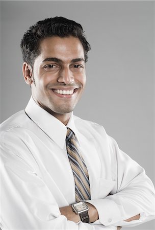 simsearch:857-03553946,k - Portrait of a businessman smiling Stock Photo - Rights-Managed, Code: 857-03553947