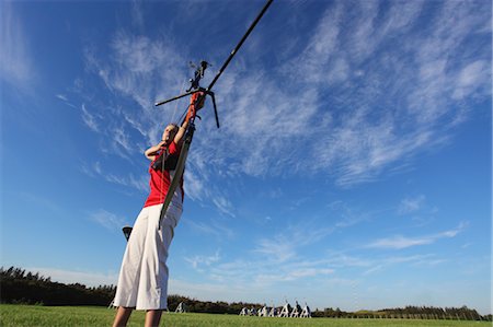 Young Female Archer Aiming at Target Foto de stock - Con derechos protegidos, Código: 858-05604824