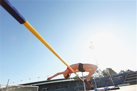 Young Female Athlete Performing High Jump Stock Photo - Rights-Managed, Code: 858-05604968
