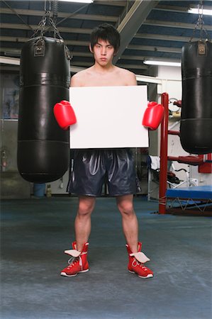 Boxer with White Board Stock Photo - Rights-Managed, Code: 858-05799215