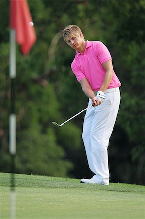 Man Playing Golf Foto de stock - Con derechos protegidos, Código: 858-05799315