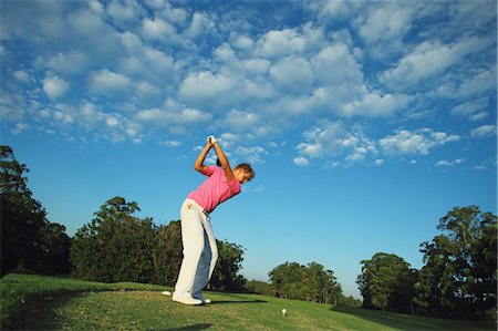 shot a goal - Golfer Concentrating on Tee Stock Photo - Rights-Managed, Code: 858-05799333