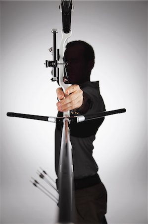 Archer Aiming With Backlit Stock Photo - Rights-Managed, Code: 858-06121550