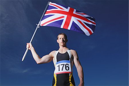 simsearch:858-06617663,k - Male Athlete Holding a British Flag Foto de stock - Direito Controlado, Número: 858-06617623