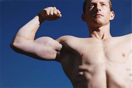 simsearch:858-06617668,k - Man Showing Muscles Stock Photo - Rights-Managed, Code: 858-06617632