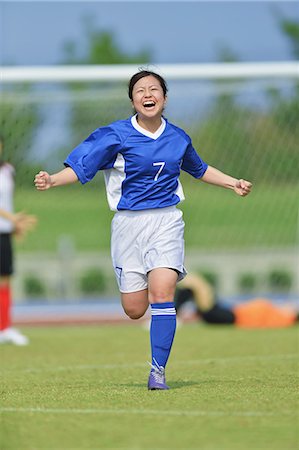 futbolista (mujer) - Women Playing Soccer Foto de stock - Con derechos protegidos, Código: 858-06617707