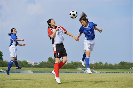 soccer jump - Women Playing Soccer Stock Photo - Rights-Managed, Code: 858-06617714