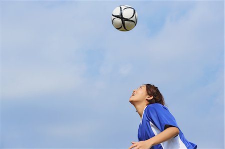 Woman Playing Soccer Foto de stock - Con derechos protegidos, Código: 858-06617735