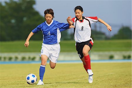 futbolista (mujer) - Women Playing Soccer Photographie de stock - Rights-Managed, Code: 858-06617739