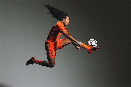 Man In Soccer Uniform With Ball Photographie de stock - Rights-Managed, Code: 858-06617787