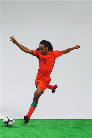 simsearch:622-07736028,k - Man In Soccer Uniform With Ball Stock Photo - Rights-Managed, Code: 858-06617782