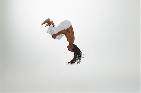 performance sports - Man Practicing Capoeira Stock Photo - Rights-Managed, Code: 858-06617798
