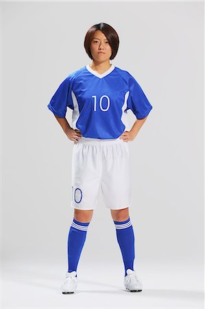soccer players - Woman In Soccer Uniform Posing Stock Photo - Rights-Managed, Code: 858-06617809