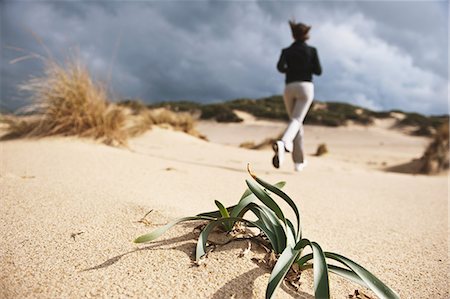 sardinia - Young Woman Running On The Beach Stock Photo - Rights-Managed, Code: 858-06756024