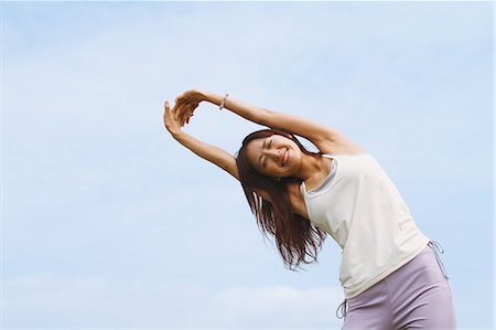 Woman Stretching Arms Stock Photo - Rights-Managed, Code: 858-06756044