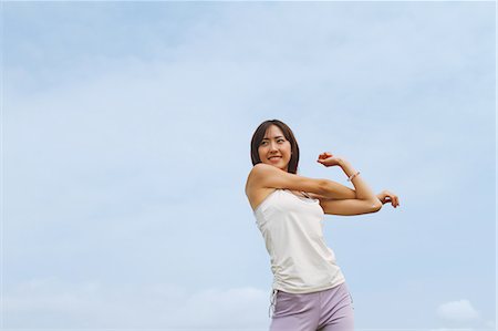 simsearch:858-06756054,k - Woman Stretching Arms Stock Photo - Rights-Managed, Code: 858-06756045