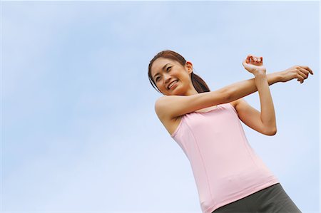 simsearch:858-06756054,k - Woman Stretching Arms Stock Photo - Rights-Managed, Code: 858-06756048