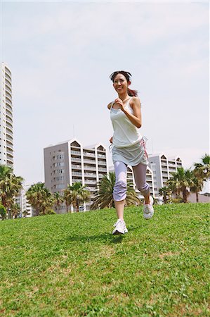 simsearch:858-06756054,k - Woman Running On Grass Stock Photo - Rights-Managed, Code: 858-06756074