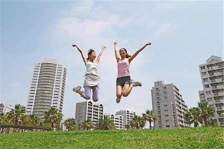 simsearch:858-06756054,k - Two Women Jumping Stock Photo - Rights-Managed, Code: 858-06756075