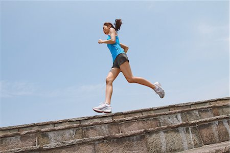 simsearch:858-06756054,k - Woman Running On Seawall Stock Photo - Rights-Managed, Code: 858-06756088