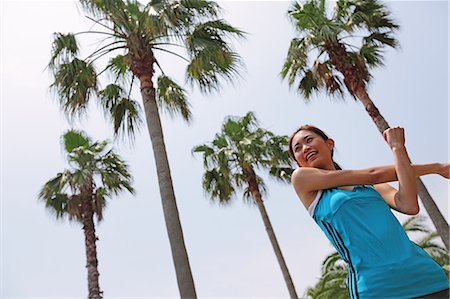 simsearch:858-06756054,k - Woman Exercising Near Palm Trees Stock Photo - Rights-Managed, Code: 858-06756108