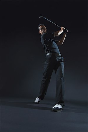 Golfer Swinging Golf Club Stock Photo - Rights-Managed, Code: 858-06756116