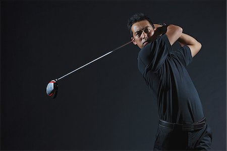 simsearch:858-06756160,k - Golfer Swinging Driver Stockbilder - Lizenzpflichtiges, Bildnummer: 858-06756111