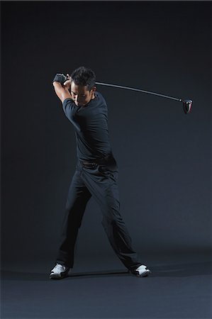 swing (sports) - Golfer Preparing To Take Shot Photographie de stock - Rights-Managed, Code: 858-06756112