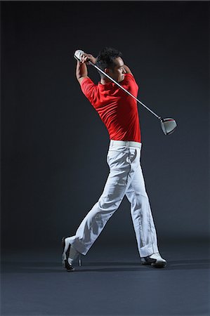 simsearch:622-05390906,k - Golfer Swinging Golf Club Stock Photo - Rights-Managed, Code: 858-06756122