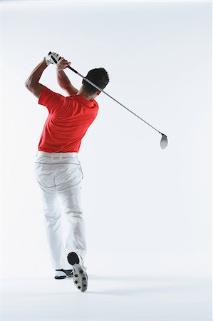 simsearch:6113-07159318,k - Golfer Swinging,  Back View Stock Photo - Rights-Managed, Code: 858-06756137