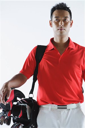 Golfer Carrying Golf-Club Bag Foto de stock - Con derechos protegidos, Código: 858-06756143
