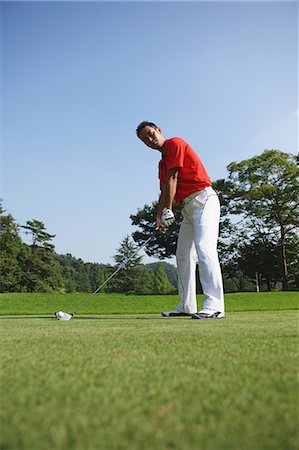 Golfer Concentrating On Shot Stock Photo - Rights-Managed, Code: 858-06756152