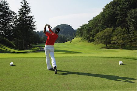 Golfer Swinging Club Stock Photo - Rights-Managed, Code: 858-06756160