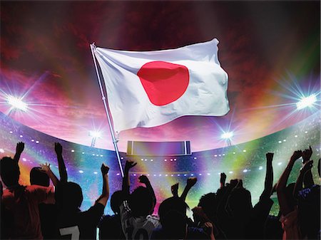 estadio deportivo - Crowd Cheering And Waving Japan Flag In Stadium Foto de stock - Con derechos protegidos, Código: 858-06756374