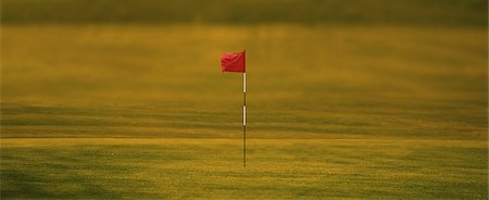 Golf Flag In Golf Course Foto de stock - Con derechos protegidos, Código: 858-06756450
