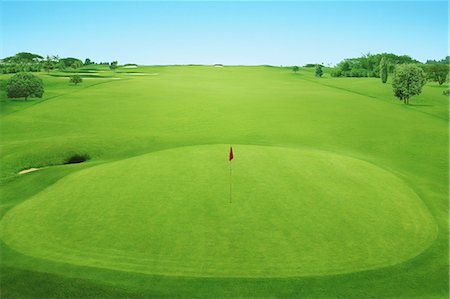 Golf Flag In Golf Course Foto de stock - Con derechos protegidos, Código: 858-06756451