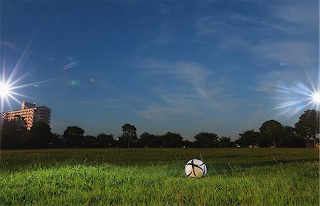 sky cloud tree field not storm not africa not people not building not city - Soccer ball and grassland Stock Photo - Rights-Managed, Code: 858-07066845