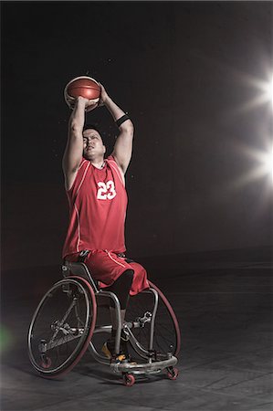 disabled asian people - Wheelchair basketbal player throwing the ball Stock Photo - Rights-Managed, Code: 858-08421622