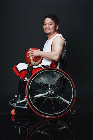 portrait black background - Wheelchair basketball player Stock Photo - Rights-Managed, Code: 858-08421666