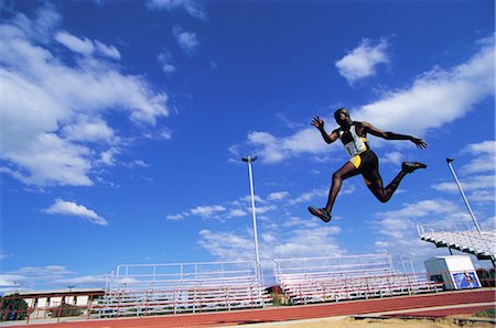 salto in lungo - Sports Fotografie stock - Rights-Managed, Codice: 858-03045909