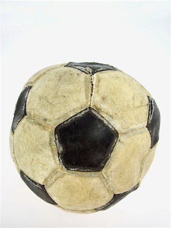 flat soccer ball - Beaten-Up Soccer Ball Stock Photo - Rights-Managed, Code: 858-03046564