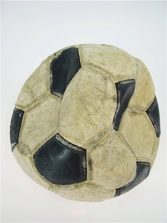 flat soccer ball - Beaten-Up Soccer Ball Stock Photo - Rights-Managed, Code: 858-03046561