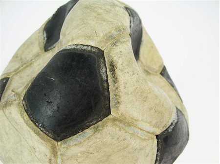 flat soccer ball - Beaten-Up Soccer Ball Stock Photo - Rights-Managed, Code: 858-03046562