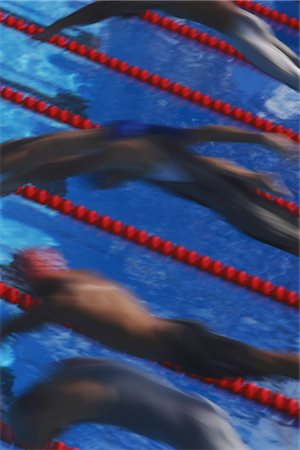 profile of person diving into pool - Swimmers diving into water Stock Photo - Rights-Managed, Code: 858-03046791