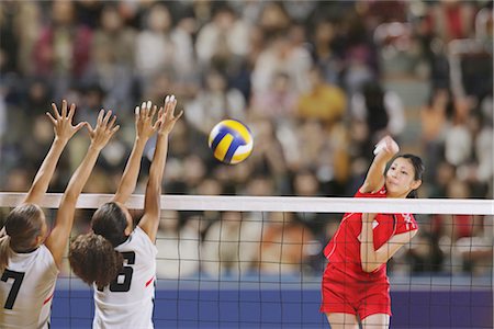 defensivo - Volleyball Players in Intense Moment Foto de stock - Con derechos protegidos, Código: 858-03046881