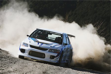 Voiture de rallye et des nuages de poussière Photographie de stock - Rights-Managed, Code: 858-03047020