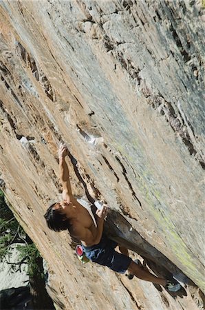 simsearch:400-04949609,k - Climber Scaling a Rock Face Stock Photo - Rights-Managed, Code: 858-03047518