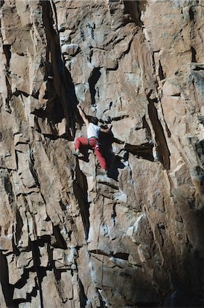 simsearch:400-04949609,k - Climber Scaling a Rock Face Stock Photo - Rights-Managed, Code: 858-03047520